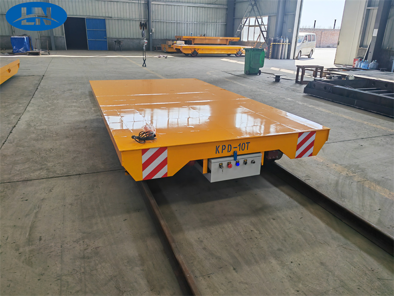 Αρχή και Χαρακτηριστικά του καροτσιού μεταφοράς σιδηροτροχιάς χαμηλής τάσης